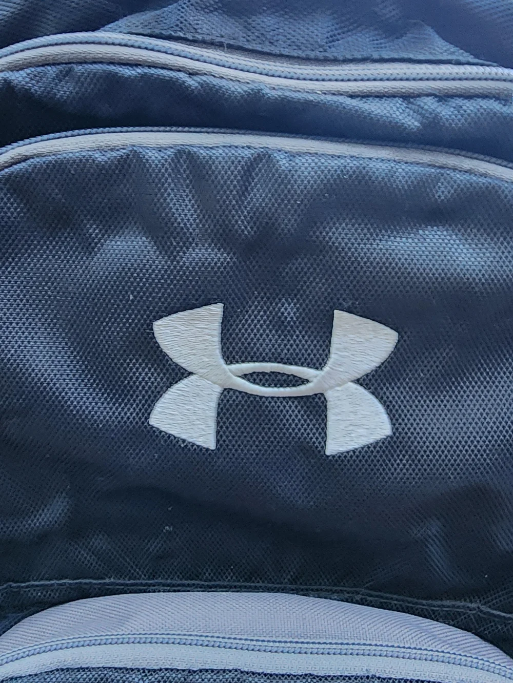 Under Armour Hustle Backpack Black Grey EFT Logo